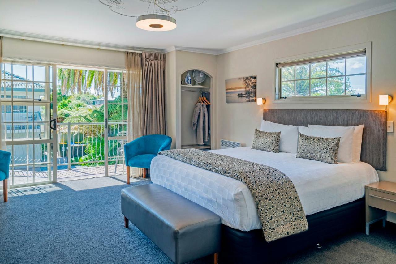 Silver Fern Rotorua Suites&Spa Exterior foto A bedroom at the hotel